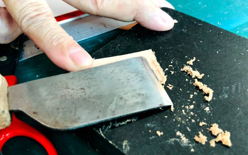 thinning leather with skiving knife