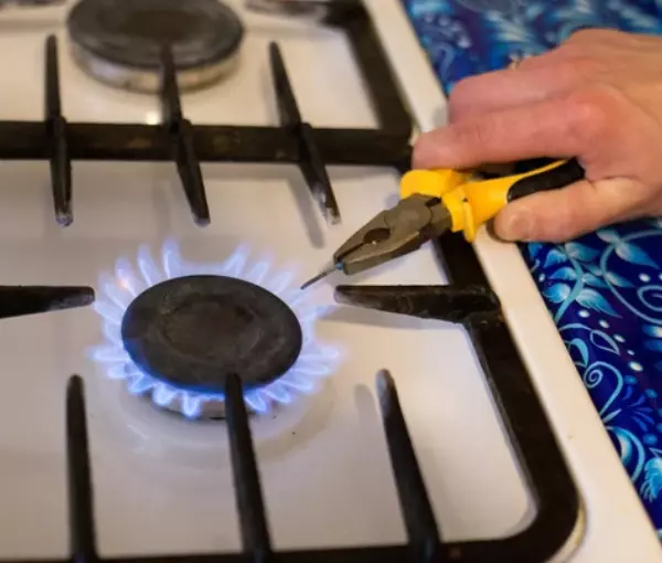 heating nail on stove